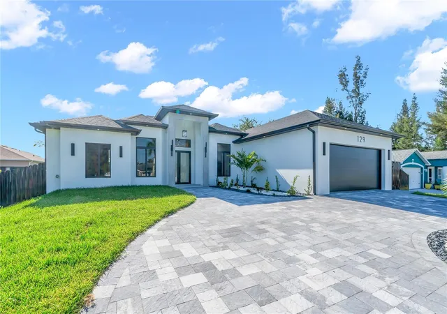 Photo 1 of Sale Pending at 129 SW 34th Avenue, Cape Coral, FL 33991 | MLS# A4702909 | Listing updated on 2026-09-05