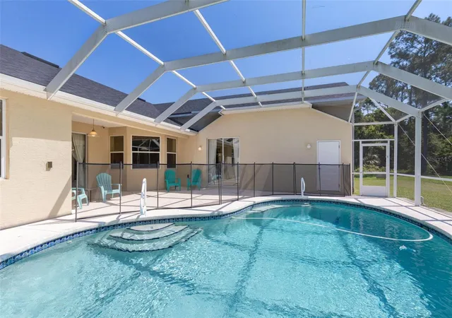 2nd image of 18 Squirrel Pl, Palm Coast, FL 32164 | MLS# FC320652