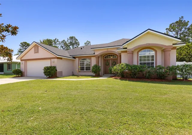1st image of 18 Squirrel Pl, Palm Coast, FL 32164 | MLS# FC320652