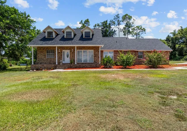 Photo 3 of Single family home for sale at 1715 Lake Miriam Dr, Lakeland, FL 33813 | MLS# L4964257 | Listing updated on 2026-10-06
