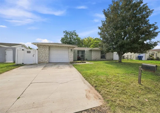 Photo 3 of Sale Pending at 9040 Crabtree Ln, Port Richey, FL 34668 | MLS# TB8538612 | Listing updated on 2026-10-03