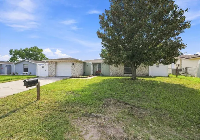 Photo 3 of Sale Pending at 9040 Crabtree Ln, Port Richey, FL 34668 | MLS# TB8538612 | Listing updated on 2026-10-03