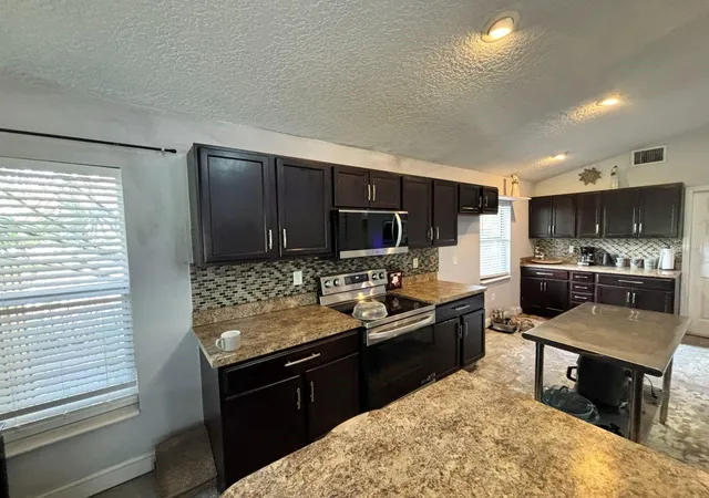 2nd image of 6473 Long Breeze Rd, Orlando, FL 32810 | MLS# O6433378