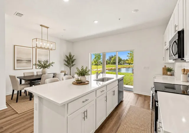 Photo 4 of Townhouse for sale at 4935 Winding River Rd, Orlando, FL 32822 | MLS# W7888571 | Listing updated on 2026-10-20