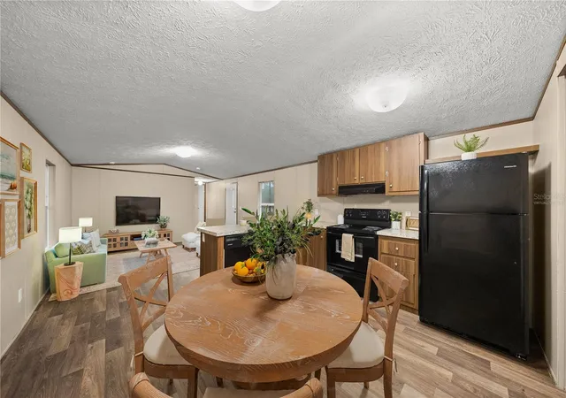 Photo 4 of Manufactured home for sale at 11945 SE 99th Court, Belleview, FL 34420 | MLS# OM730363 | Listing updated on 2026-09-20
