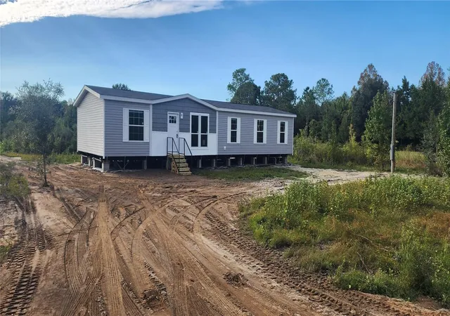 Photo 1 of Manufactured home for sale at 1636 Mistletoe St, Bunnell, FL 32110 | MLS# O6433395 | Listing updated on 2026-10-23