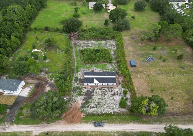 Photo 2 of Manufactured home for sale at 1636 Mistletoe St, Bunnell, FL 32110 | MLS# O6433395 | Listing updated on 2026-09-08