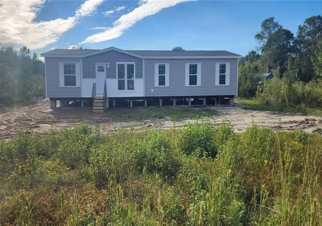 Photo 3 of Manufactured home for sale at 1636 Mistletoe St, Bunnell, FL 32110 | MLS# O6433395 | Listing updated on 2026-10-23