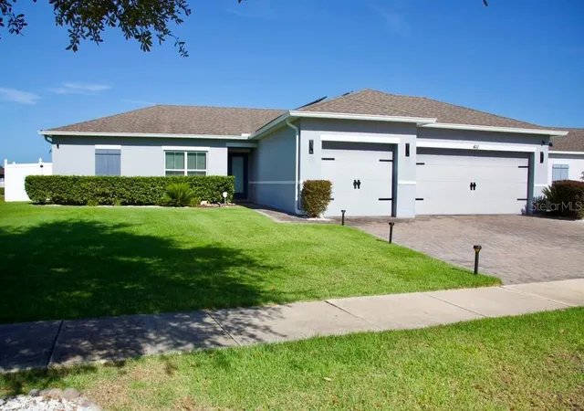 Photo 1 of Single family home for sale at 411 Blue Lake Cir, Kissimmee, FL 34758 | MLS# O6433405 | Listing updated on 2026-08-15