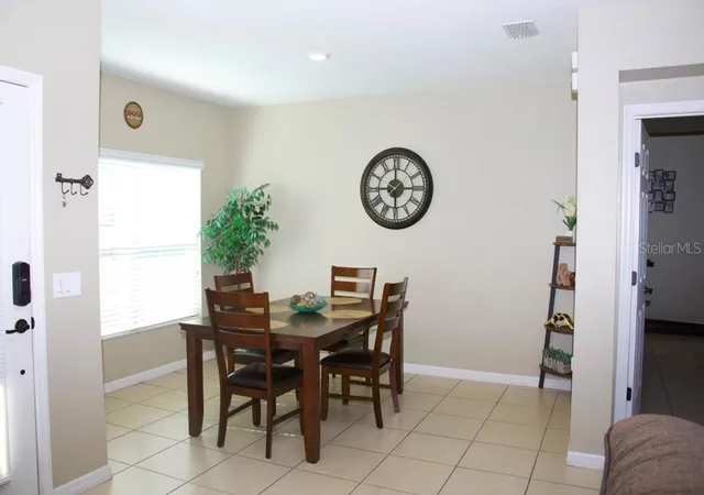 Photo 3 of Single family home for sale at 411 Blue Lake Cir, Kissimmee, FL 34758 | MLS# O6433405 | Listing updated on 2026-08-15