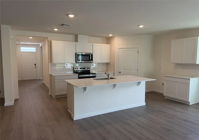 Photo 2 of Single family home for sale at 1049 Champion Ridge Dr, Daytona Beach, FL 32124 | MLS# O6433430 | Listing updated on 2026-08-26