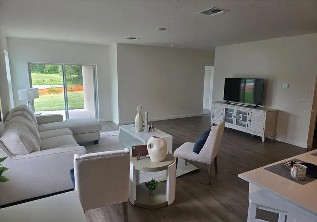 Photo 3 of Single family home for sale at 1049 Champion Ridge Dr, Daytona Beach, FL 32124 | MLS# O6433430 | Listing updated on 2026-10-08