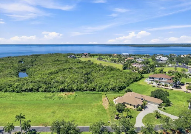 Photo 1 of Land for sale at 21361 Harborside Blvd, Port Charlotte, FL 33952 | MLS# TB8538697 | Listing updated on 2026-08-14