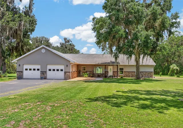 Single family home for sale at 19785 NW 123rd Court, MICANOPY, FL 32667 | MLS# OM730383