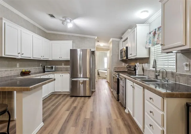Photo 2 of Manufactured home for sale at 14019 Royal Fern Way, Astatula, FL 34705 | MLS# O6433500 | Listing updated on 2026-09-29