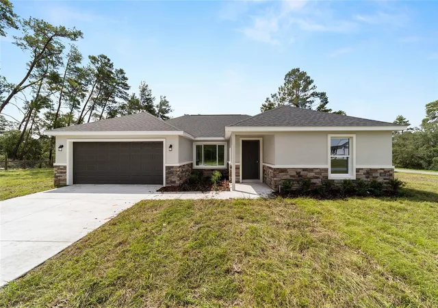 1st image of 22060 Sw Neptune Blvd, Dunnellon, FL 34431 | MLS# O6433530