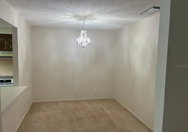 Listing Photo 4 - Condo for sale in building located at 1124 85Th Ter N, ST PETERSBURG, FL 33702 - Unit #D