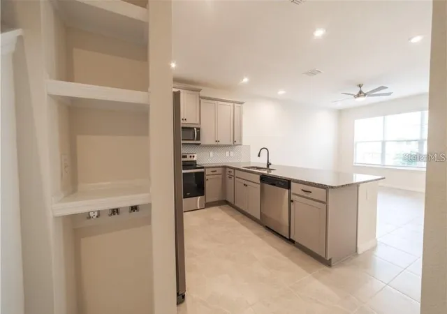 Photo 3 of Townhouse for sale at 8860 Herencia Aly, Windermere, FL 34786 | MLS# O6433569 | Listing updated on 2026-08-15
