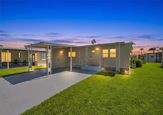 Photo 1 of Manufactured home for sale at 10912 Justice Dr, Port Richey, FL 34668 | MLS# TB8538985 | Listing updated on 2026-08-30