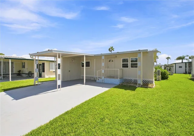 Photo 2 of Manufactured home for sale at 10912 Justice Dr, Port Richey, FL 34668 | MLS# TB8538985 | Listing updated on 2026-08-30