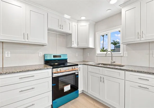 Photo 5 of Manufactured home for sale at 10912 Justice Dr, Port Richey, FL 34668 | MLS# TB8538985 | Listing updated on 2026-08-30