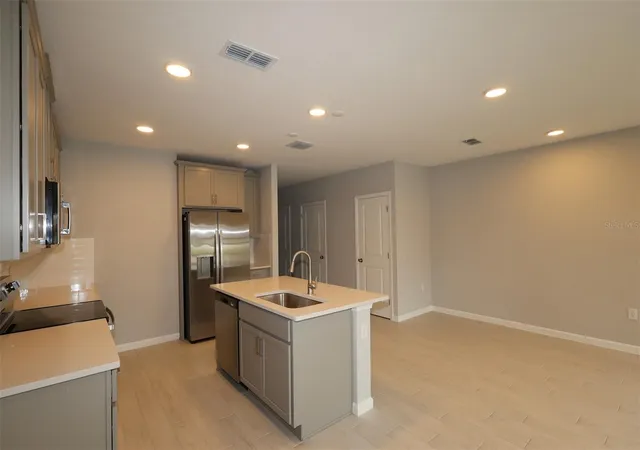Photo 2 of Townhouse for sale at 6104 Fellow Wagon Way, Orlando, FL 32822 | MLS# O6433671 | Listing updated on 2026-10-06