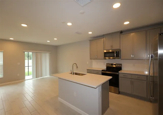 Photo 2 of Townhouse for sale at 6104 Fellow Wagon Way, Orlando, FL 32822 | MLS# O6433671 | Listing updated on 2026-09-11
