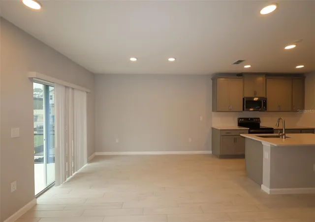 Photo 3 of Townhouse for sale at 6104 Fellow Wagon Way, Orlando, FL 32822 | MLS# O6433671 | Listing updated on 2026-09-11