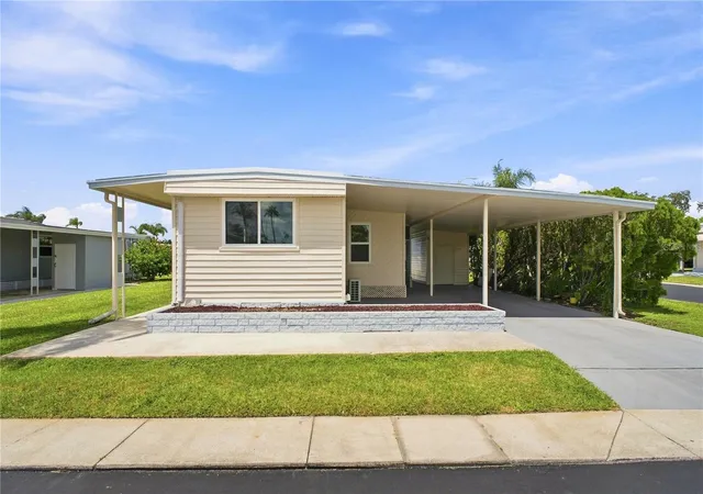 Photo 1 of Manufactured home for sale at 10929 Tioga Dr, Port Richey, FL 34668 | MLS# TB8539005 | Listing updated on 2026-08-31