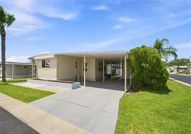 Photo 2 of Manufactured home for sale at 10929 Tioga Dr, Port Richey, FL 34668 | MLS# TB8539005 | Listing updated on 2026-08-31