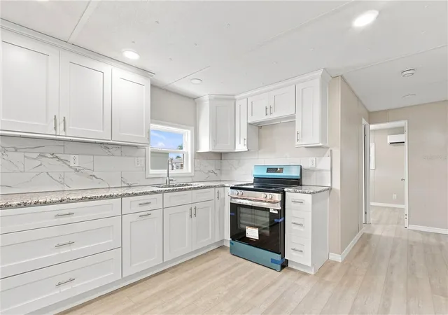 Photo 5 of Manufactured home for sale at 10929 Tioga Dr, Port Richey, FL 34668 | MLS# TB8539005 | Listing updated on 2026-08-31