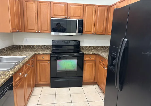 Photo 3 of Townhouse for sale at 2490 Lancien Ct #4, Orlando, FL 32826 | MLS# O6433707 | Listing updated on 2026-09-25
