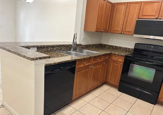 Photo 3 of Townhouse for sale at 2490 Lancien Ct #4, Orlando, FL 32826 | MLS# O6433707 | Listing updated on 2026-09-25