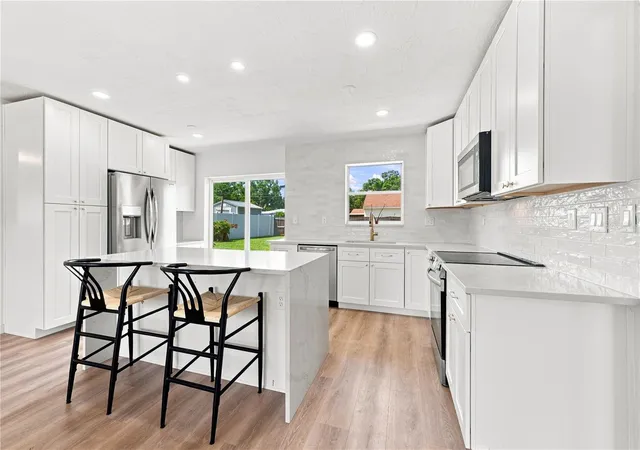 Photo 3 of Single family home for sale at 933 41st Avenue NE, Saint Petersburg, FL 33703 | MLS# TB8539092 | Listing updated on 2026-10-13
