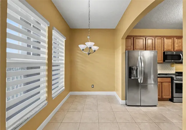 Photo 3 of Condo for sale at 1411 Celebration Ave #206, Celebration, FL 34747 | MLS# O6433815 | Listing updated on 2026-09-02