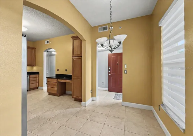 Photo 4 of Condo for sale at 1411 Celebration Ave #206, Celebration, FL 34747 | MLS# O6433815 | Listing updated on 2026-09-02