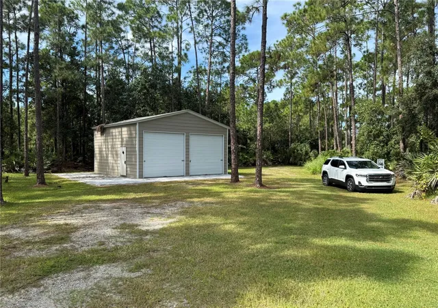 Photo 2 of Manufactured home for sale at 1161 Lake Harney Woods Blvd, Mims, FL 32754 | MLS# O6433877 | Listing updated on 2026-09-30