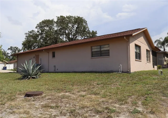 Photo 2 of Single family home for sale at 8949 Forest Lake Dr, Port Richey, FL 34668 | MLS# W7888643 | Listing updated on 2026-09-25