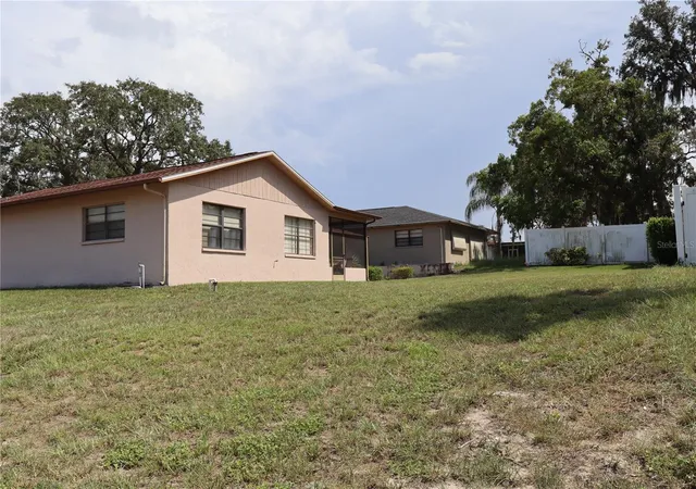 Photo 3 of Single family home for sale at 8949 Forest Lake Dr, Port Richey, FL 34668 | MLS# W7888643 | Listing updated on 2026-09-25