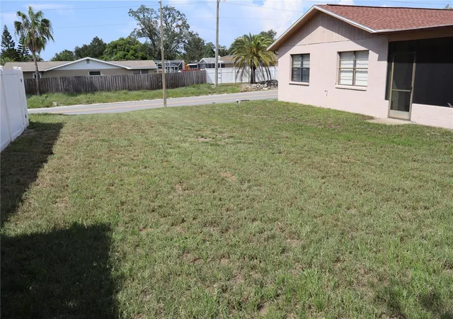 Photo 4 of Single family home for sale at 8949 Forest Lake Dr, Port Richey, FL 34668 | MLS# W7888643 | Listing updated on 2026-09-25