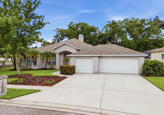 Photo 1 of Single family home for sale at 14902 Devonshire Woods Pl, TAMPA, FL 33624 | MLS# TB8539326 | Listing updated on 2026-10-07