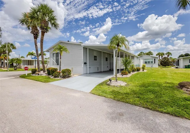 Photo 1 of Manufactured home for sale at 2100 Kings Hwy #144, Port Charlotte, FL 33980 | MLS# C7529645 | Listing updated on 2026-09-02