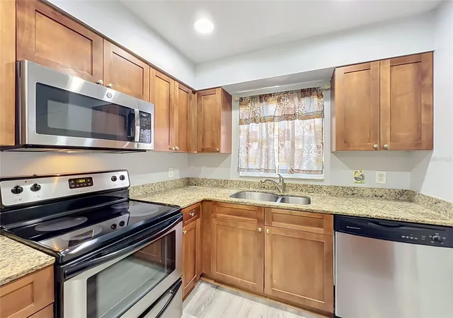 Photo 3 of Condo for sale at 5440 E Michigan St #5440-2, Orlando, FL 32812 | MLS# O6433979 | Listing updated on 2026-09-29
