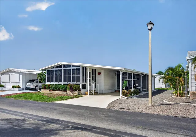 Photo 3 of Manufactured home for sale at 11 Del Prado Dr, Englewood, FL 34223 | MLS# N6145386 | Listing updated on 2026-09-21