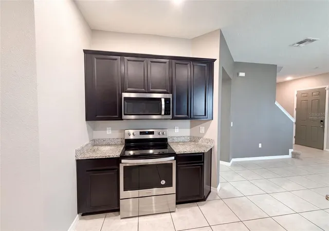 Photo 2 of Single family home for sale at 1572 Astoria Arbor Ln, Orlando, FL 32824 | MLS# O6434018 | Listing updated on 2026-09-21