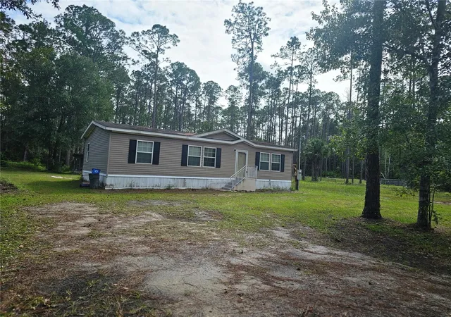 Photo 1 of Manufactured home for sale at 1387 Water Oak Rd, Bunnell, FL 32110 | MLS# FC320721 | Listing updated on 2026-10-29