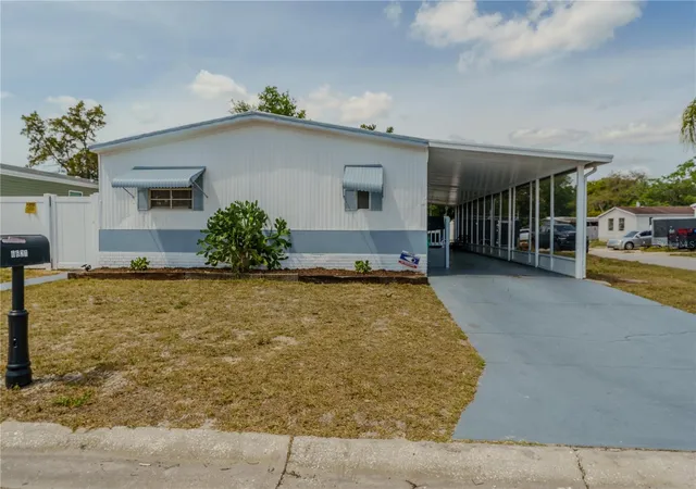 Photo 3 of Manufactured home for sale at 6621 Bandura Ave, New Port Richey, FL 34653 | MLS# TB8539411 | Listing updated on 2026-08-21