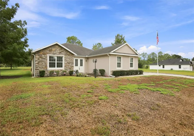 1st image of 555 Dowling Cir, Lady Lake, FL 32159 | MLS# OM730516