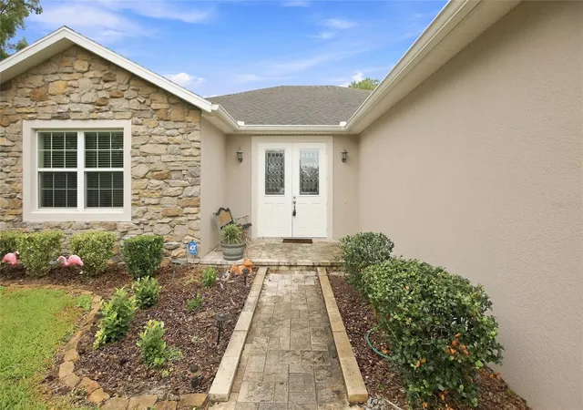image of 555 Dowling Cir, Lady Lake, FL 32159 | MLS# OM730516