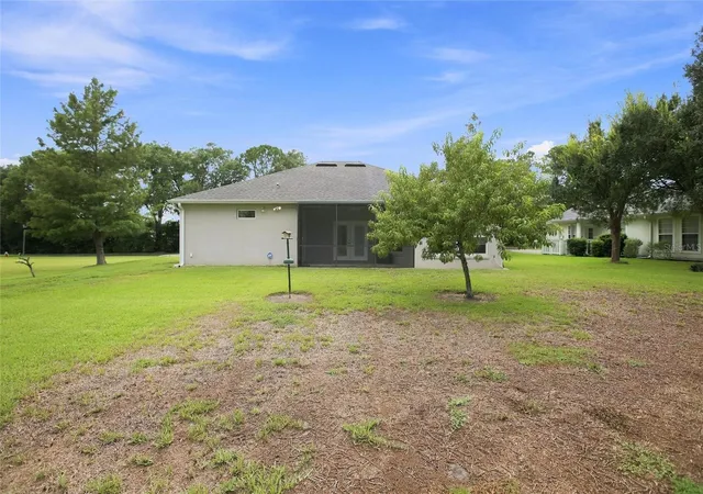 image of 555 Dowling Cir, Lady Lake, FL 32159 | MLS# OM730516